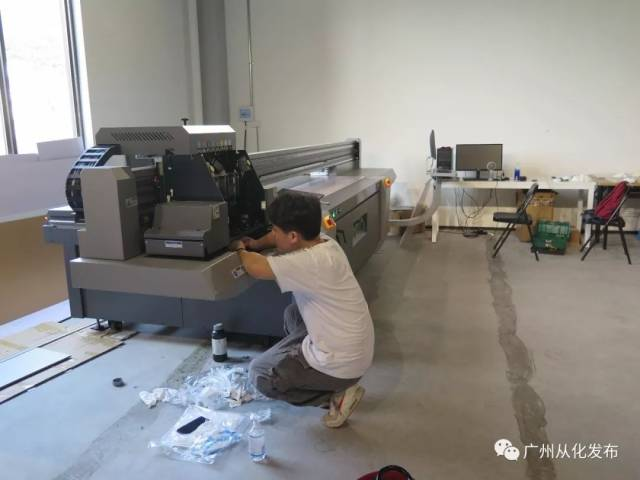 A Student is Repairing a Digital Art Printer